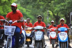 Group of people riding electric bikes